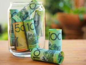 australia dollars glass saving money concept