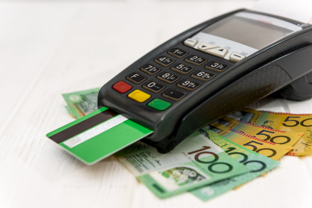 banking terminal with credit card australian dollar banknotes